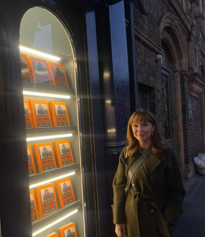 Assembling Ailish book by Sharon Guard on display in window of Books Upstairs Bookshop